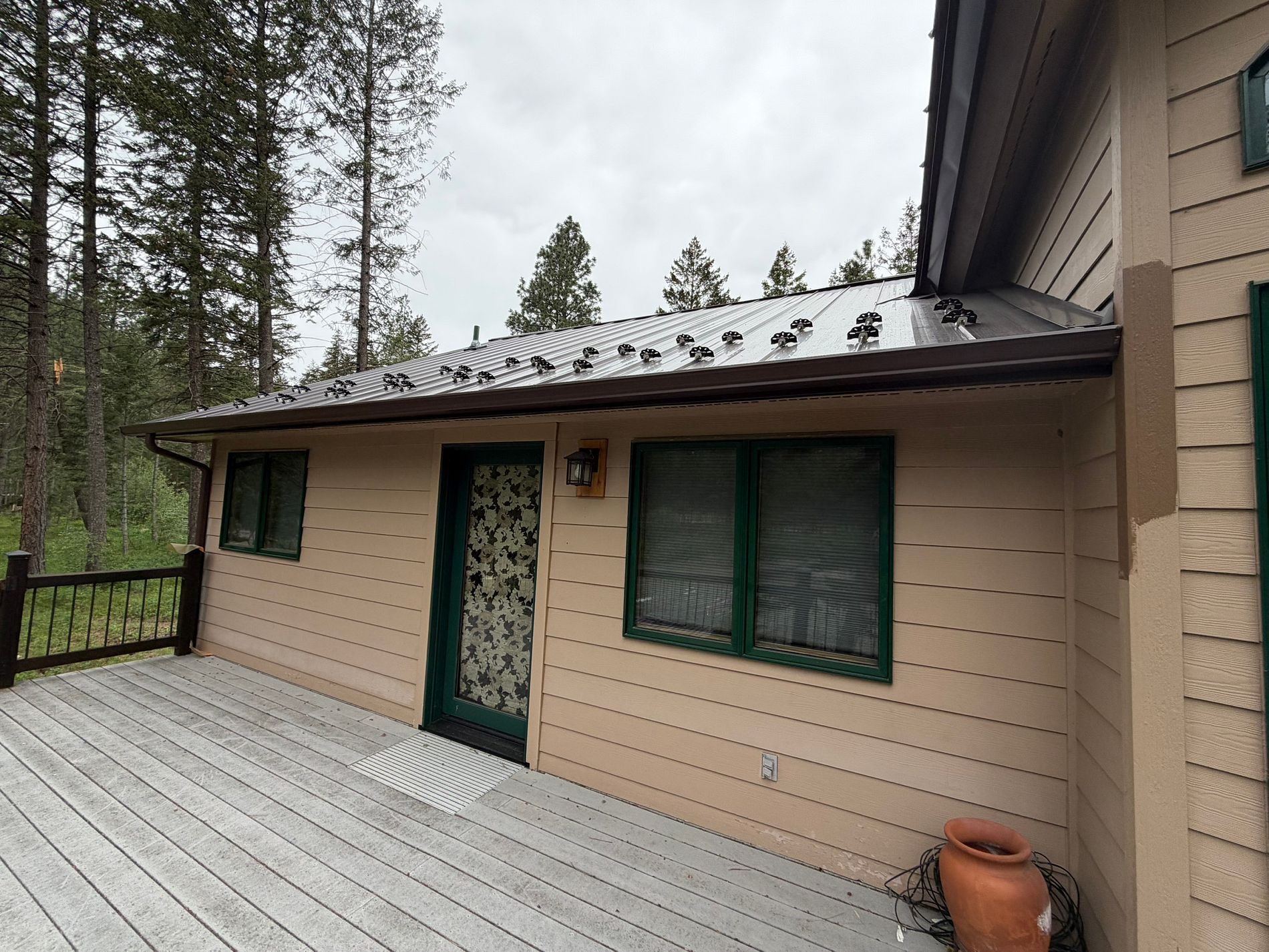 Home exterior with an aging gutter edge before new gutters were installed — before